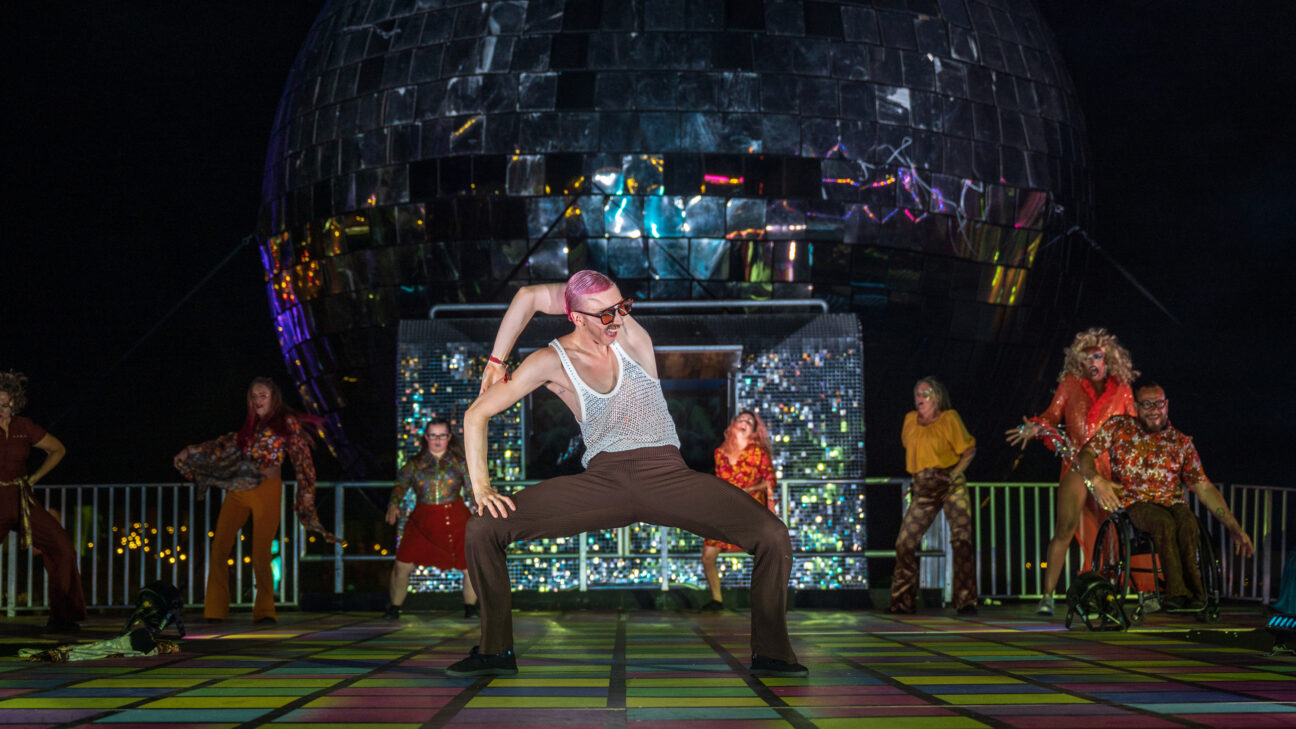 Frank the drag king performs on stage at Camp Bestival