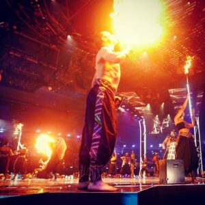 A performer breathes fire on stage with Janet Jackson at the MTV Europe Music Awards, Bilbao