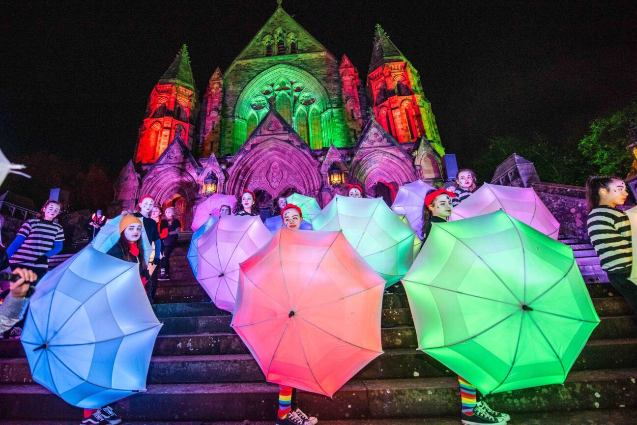 LED Umbrella dancers performing on the steps of Paisley Abbey, Paisley Halloween Festival 2019