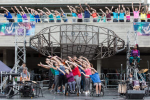 Community chorus perform at National Theatre River Stage in Extraordinary Bodies What Am I Worth?