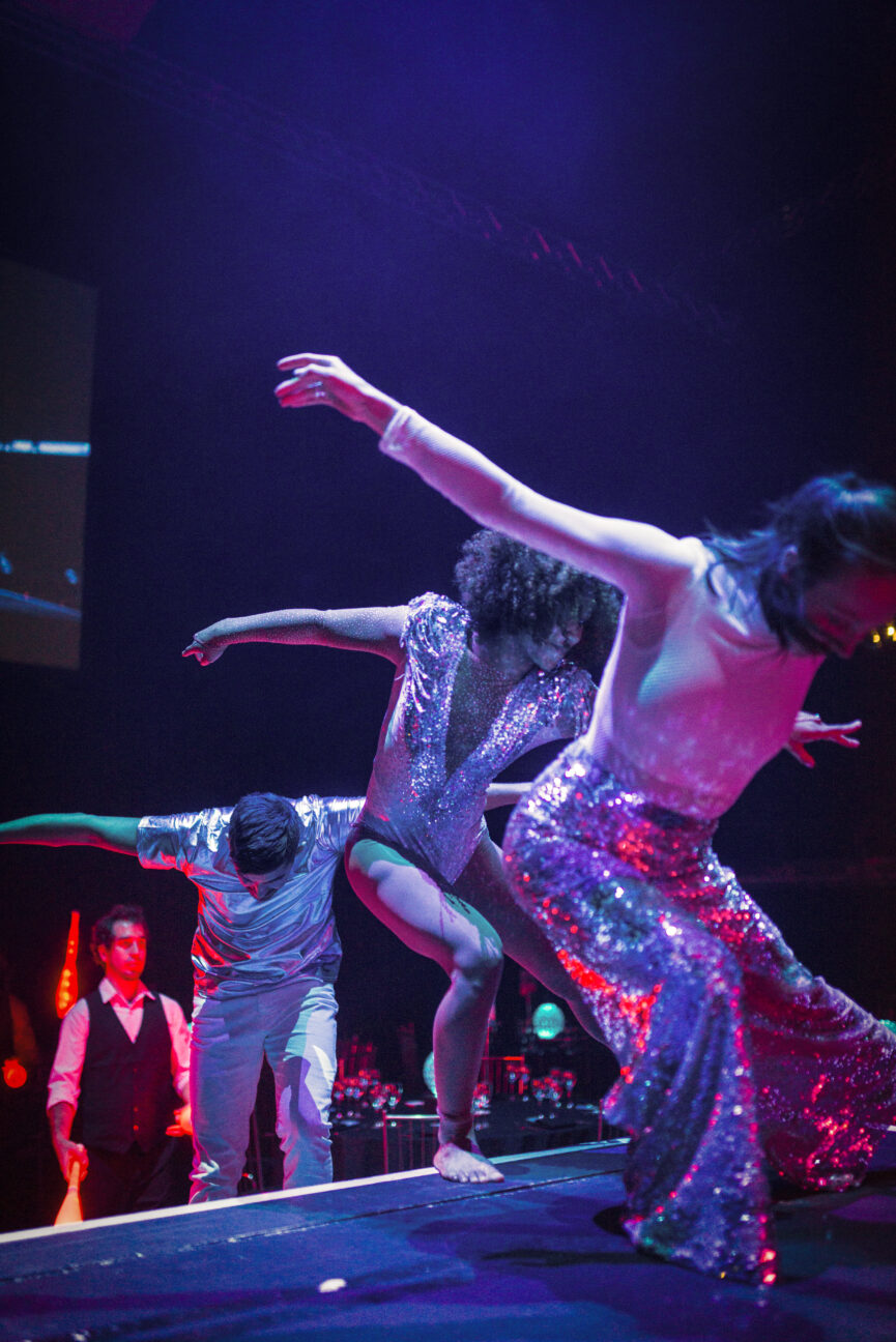 Dancers emerge on to stage ready to perform