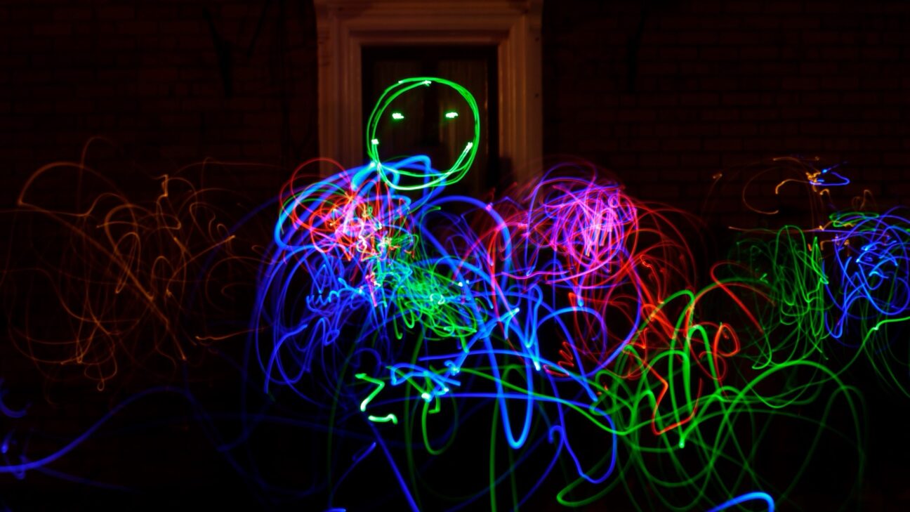 Kitchen Circus Project, a drawing made with colourful lights. Scribbles and a smiley face.